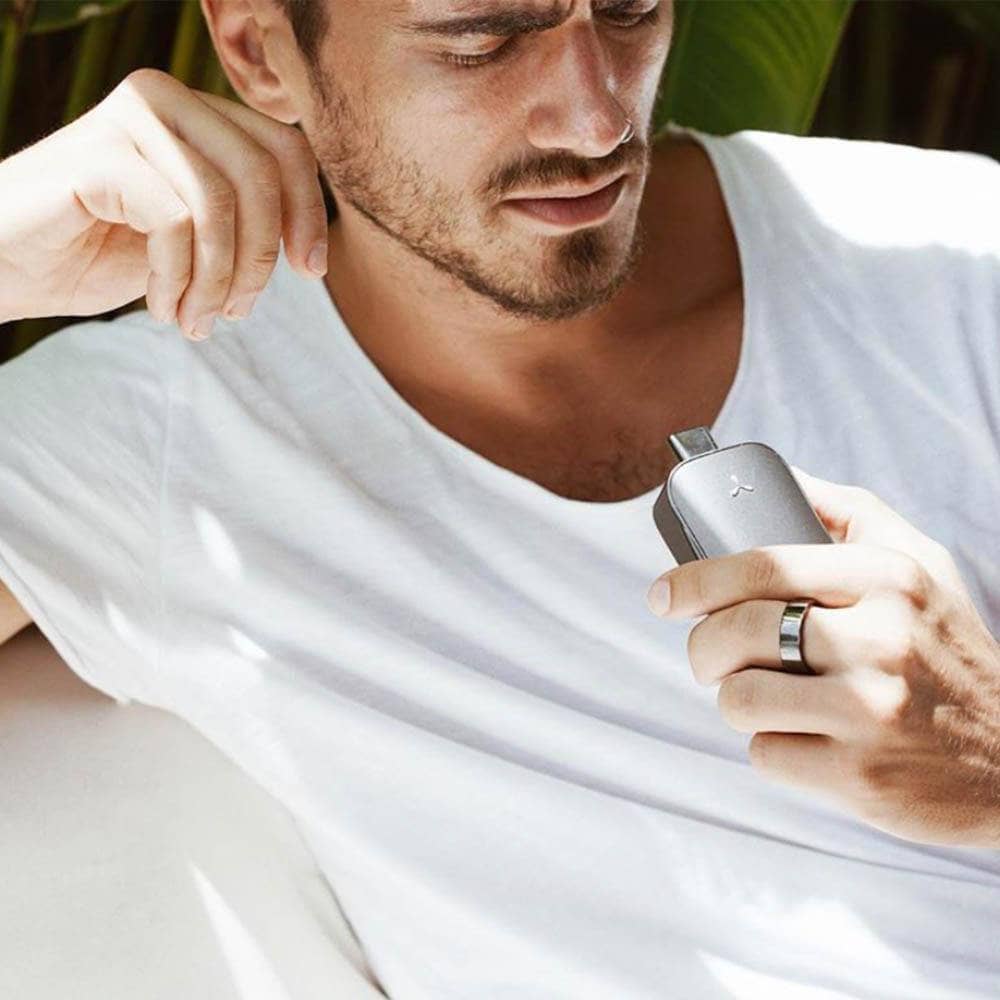 Airvape Legacy vaporizer size in hand man