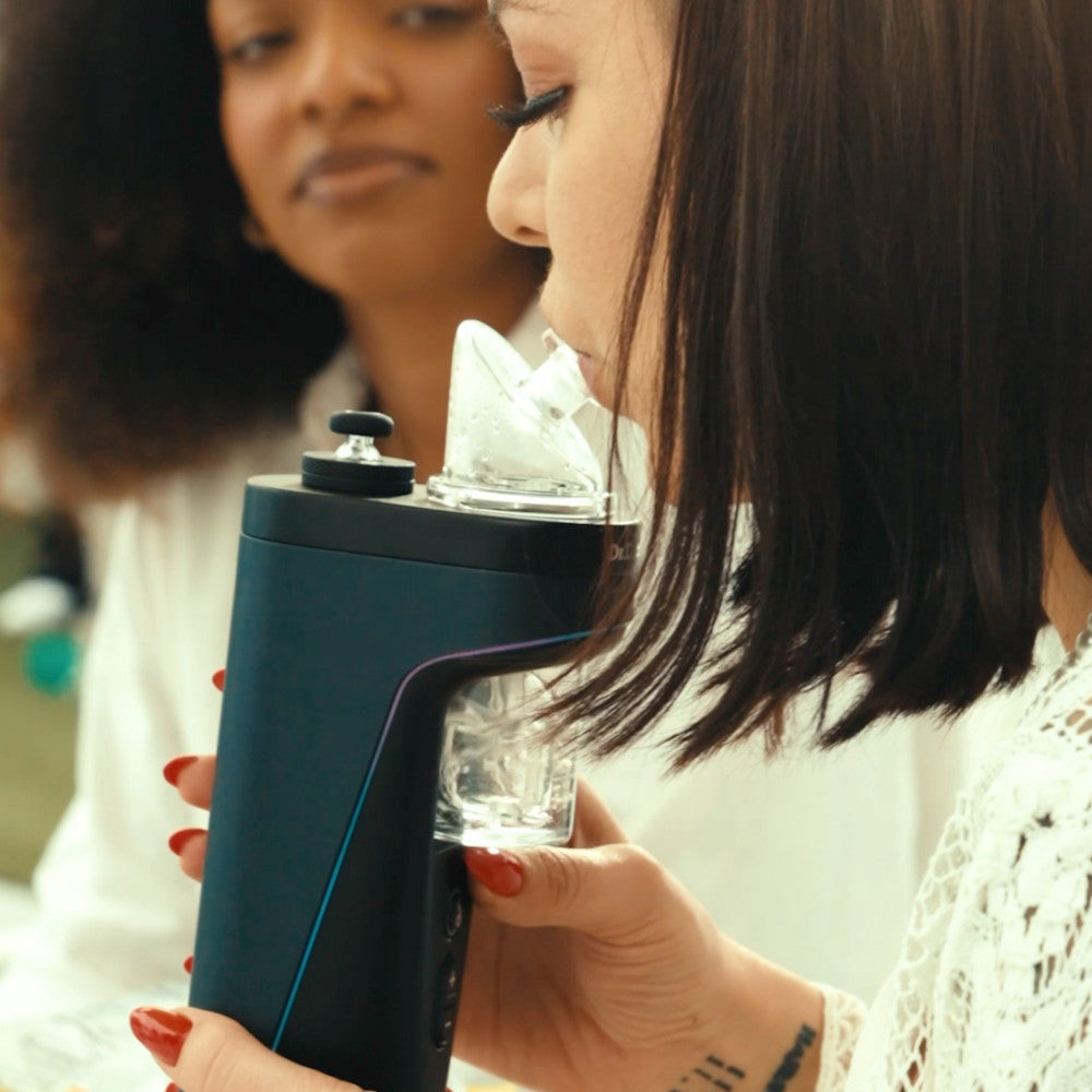 Dr Dabber Switch 2 in use woman